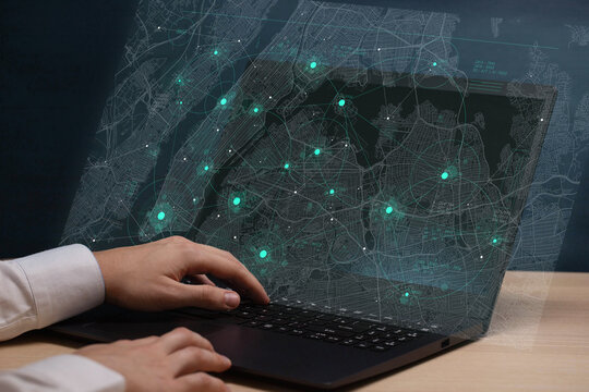 Digital visualization of big data on New York map background, futuristic technology and network connection, big smart city virtual database, Businessman working with laptop computer and navigation