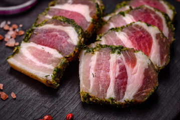 Delicious fresh bacon stripes with spices and salt