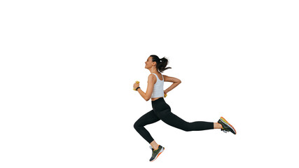 Fototapeta na wymiar Cheerful young fit woman in sportswear running against transparent background. Focused female runner preparing for Olympics. Pro sport, endurance. Brunette multiethnic girl running, active people.