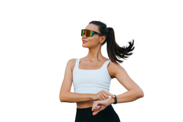 Tanned multiethnic young woman in sportswear, sunglasses measuring heart beat using fitness bracelet makes break of jogging standing against transparent background . Sport, fitness.