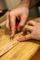 close up of a hand holding a brush
