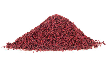 Ground sumac spice pile isolated on a white background. Dried ground red sumac powder.