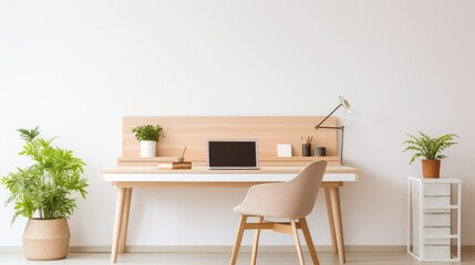 Fototapeta premium Home office setup with a laptop on a wooden desk, flanked by indoor plants.