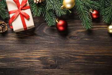 Fototapeta na wymiar Christmas background. Christmas present and holiday decorations. Flat lay image.