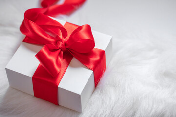 Happy New Year background, new year holidays card with gift box on the white background. Copy space