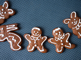 Festive biscuits brown color and decorated and shaped hare man and bear