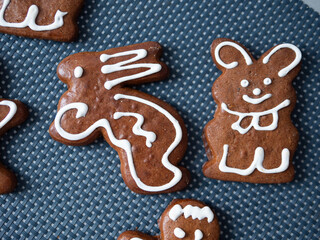 Festive biscuits brown color and decorated and shaped hare man and bear