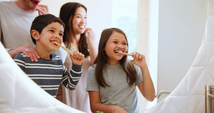 Happy family, brushing teeth and hygiene in mirror, reflection and bathroom for parents, children and laughing. Dental care, oral health and toothbrush with toothpaste, gum disease, cleaning mouth