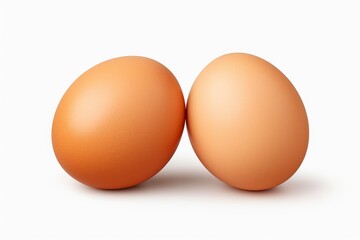 Two Eggs Side by Side on White Surface