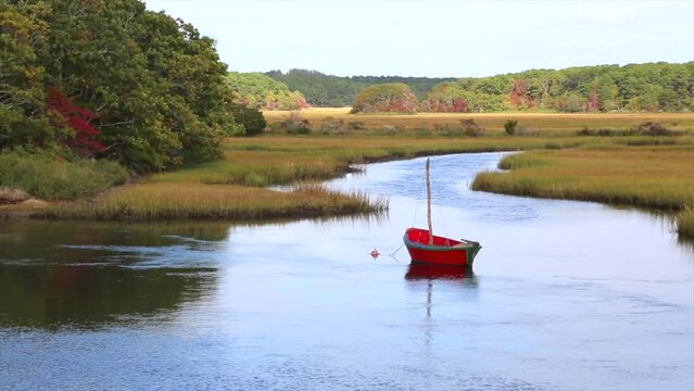 Old Fashioned Red Row Boats on Herring River at Harwich, Cape Cod