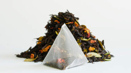 Transparent nylon pyramid tea bag with flavored black tea, with the addition of fruits and berries,...