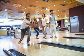 Friends playing bowling