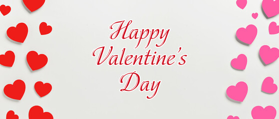 Paper hearts and text HAPPY VALENTINE'S DAY on light background