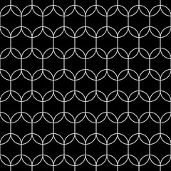 Fototapeta premium Black figures tessellation on white background. Image with oval and hexagonal shapes. Ethnic mosaic tiles motif. Ancient seamless surface pattern design with interlocking circular oriental ornament.