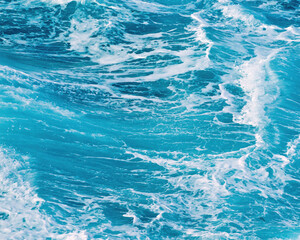 gentle ocean waves in the blue tropical sea