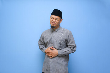 Stomach ache, man with abdominal pain suffering at fasting, health problems concept