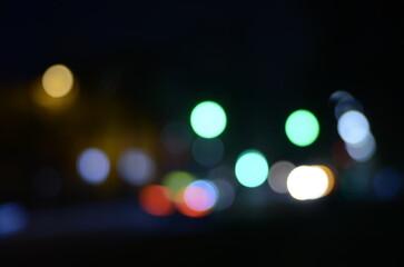 Blurred view of night city street