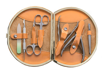 Set of steel manicure instruments and tools in orange leather case isolated on white background