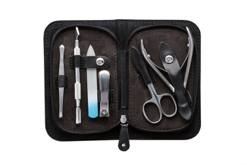 Set of steel manicure instruments and tools in black leather case isolated on white background