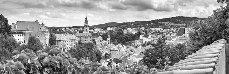 City landscape, panorama, banner - view over the historical part Cesky Krumlov with Vltava river in summer time, Czech Republic, in black-and-white color
