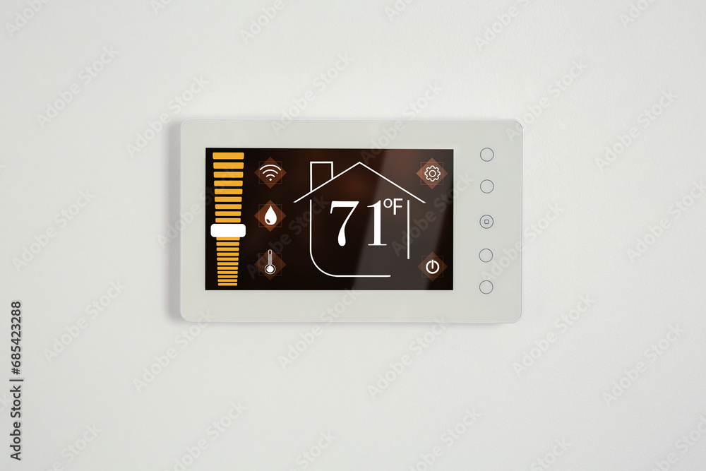 Poster thermostat displaying temperature in fahrenheit scale and different icons. smart home device on whit