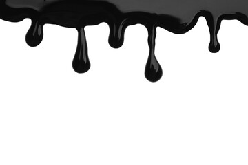 Black viscous liquid flowing on white background