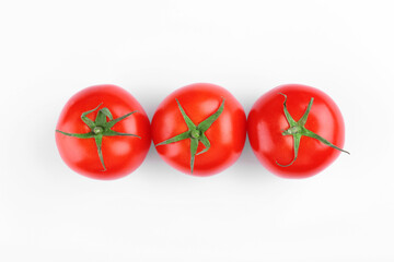 Ripe tomatoes on white background, top view