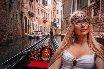 Fototapeta na wymiar A serene gondola ride through the picturesque canals of Venice, Italy. This image captures the timeless beauty of the city and is part of a summer collection.