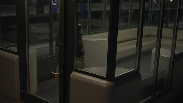 Worried Elderly Woman Waiting Anxious At Trainstation For Friend