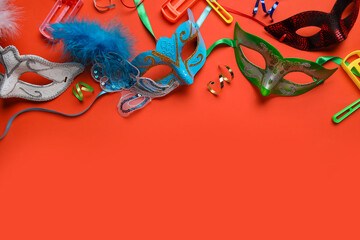 Carnival masks with decor on orange background