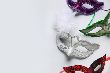 Carnival masks on white background