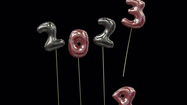 colored new year mylar balloon writing 2023 with the 3 flying away and 4 floating up to form 2024 black and red.
