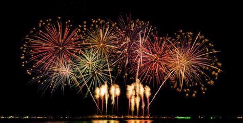 Fireworks show under defocus or blur concepts with isolated black background at night, this...
