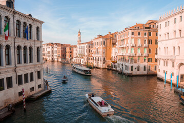Fototapeta na wymiar Breathtaking view of the Grand Canal in Venice, Italy, showcasing stunning architecture and scenery. Part of a collection highlighting the beauty of Venice during the summer.