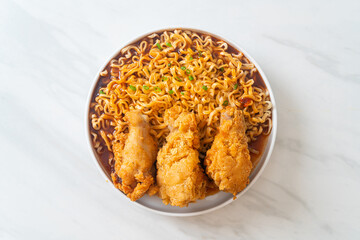 Korean instant noodles with fried chicken or Fried chicken ramyeon