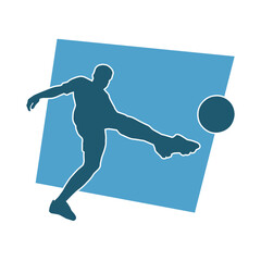 Silhouette of a man playing soccer. Silhouette of a football player in action pose.