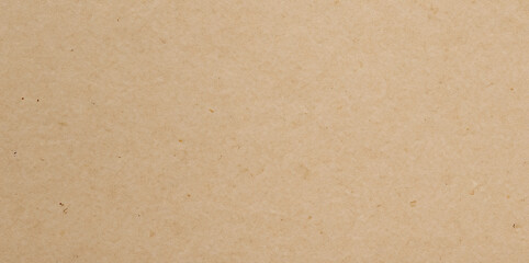 Brown craft paper texture background or cardboard surface for design