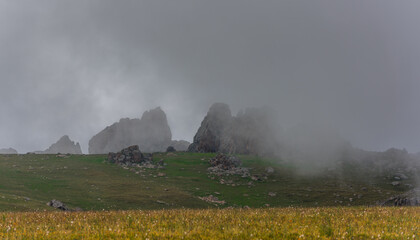 Picturesque rocks on a high plateau on a cloudy day
