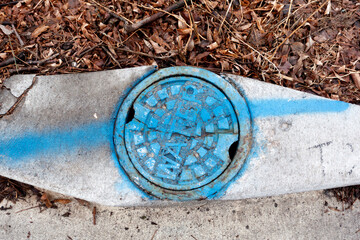 Decorated street water cover painted blue. St Paul Minnesota MN USA