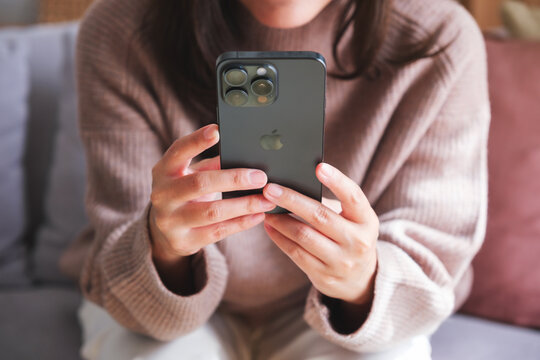 Nov 20th 2023 : A Woman Holding And Using Iphone 15 Pro Max Smart Phone Screen, Chiang Mai Thailand