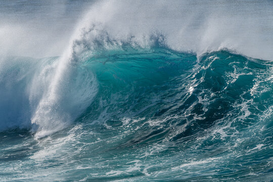 Backwash hitting big wave