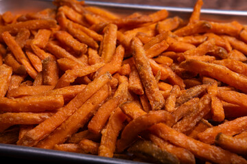 High Angle view of Air fried sweet potato fries Background on a tray