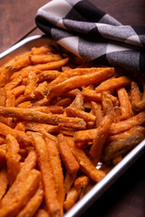High Angle view of Air fried sweet potato fries Background on a tray