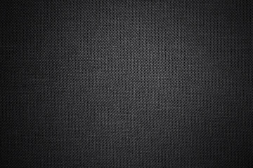 Black grey fabric cloth texture for background, natural textile pattern.