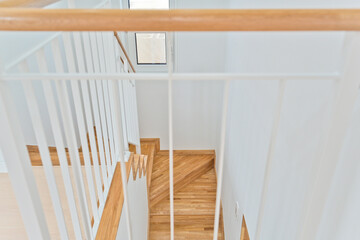 If you choose white for the staircase railing, the overall house will have a clean and modern feel