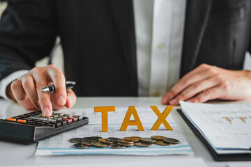 Business TAX plan development for fill in the income tax online return form for payment. Financial research,government taxes and calculation tax return concept.
