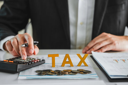 Business TAX plan development for fill in the income tax online return form for payment. Financial research,government taxes and calculation tax return concept.