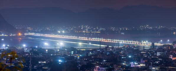 Super panoramic view of Vijayawada city in twilight is the second largest city in the state of...