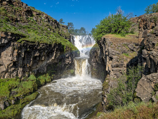 Fototapeta na wymiar The cascading waterfalls at White River Falls State Park in Oregon, USA