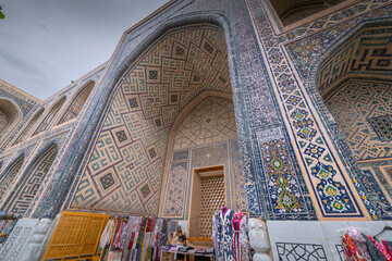 Fototapeta na wymiar Souvenir shops at the Registan square in Samarkand, Uzbekistan.